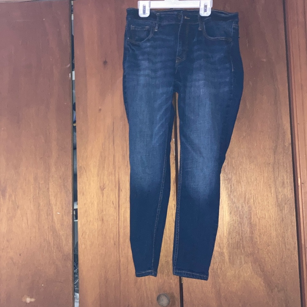 Dark blue lightly worn blue jeans